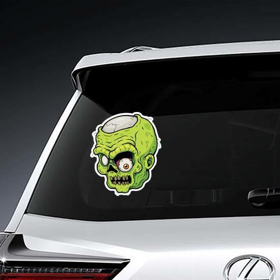 Cartoon Zombie Face With Falling Eye Sticker | Zombie Stickers Evil & Wicked Stickers Zombie Stickers